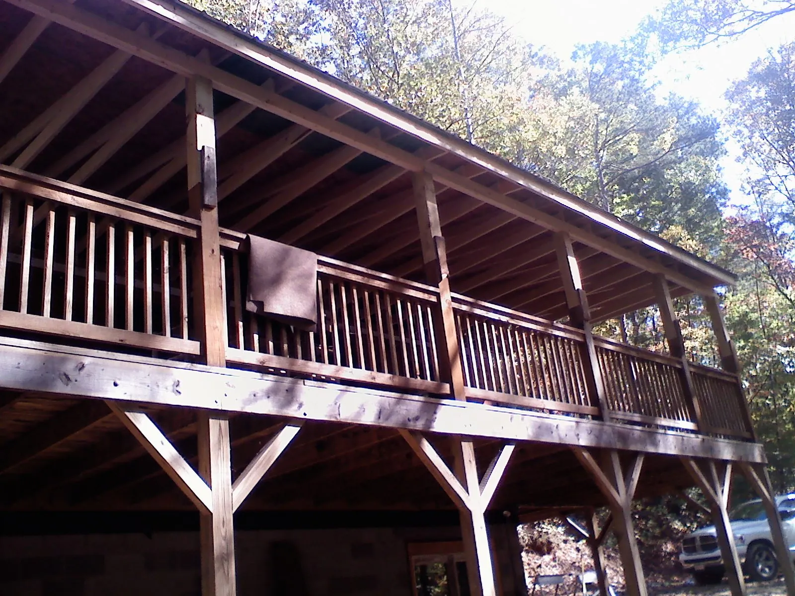 Timber framing under a new elevated porch and deck — Roof Leak Repair in Nova by Roofing Brothers
